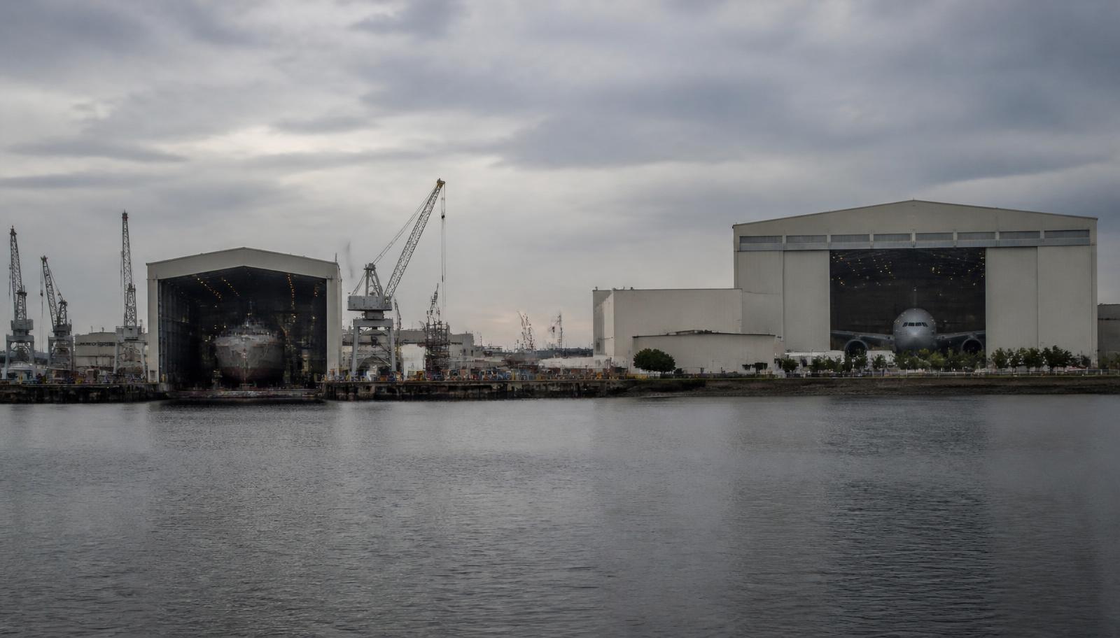 Mobile Alabama shipbuilding and Airbus assembly line along the Gulf Coast at golden hour