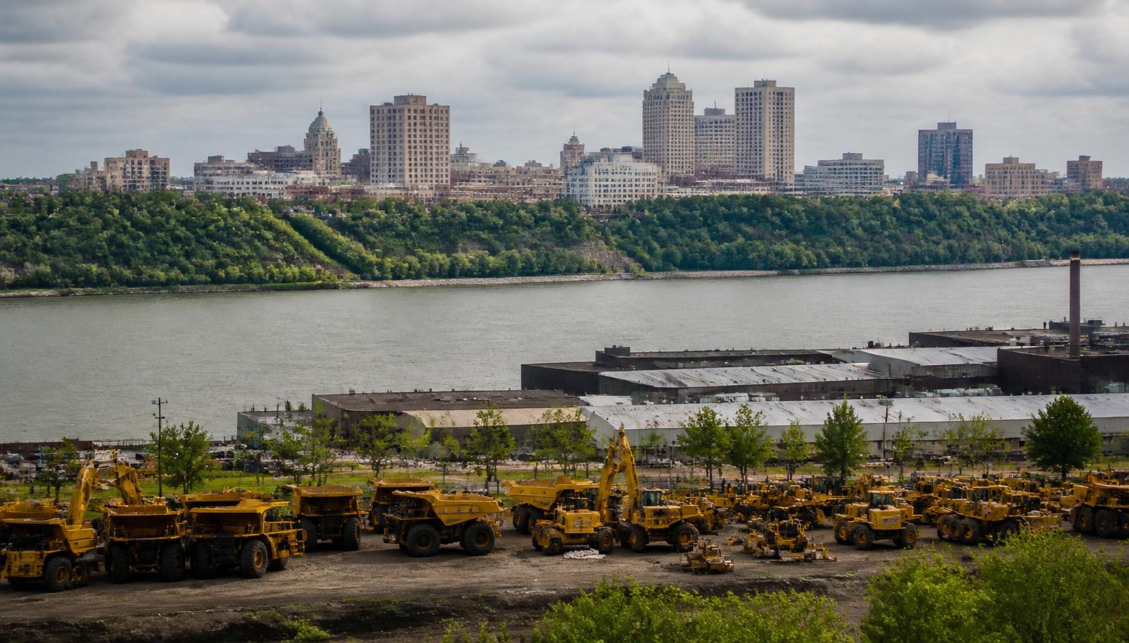Peoria Illinois heavy equipment manufacturing corridor along the Illinois River at golden hour